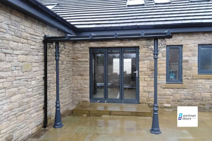 Door canopy and carport fitted to a home
